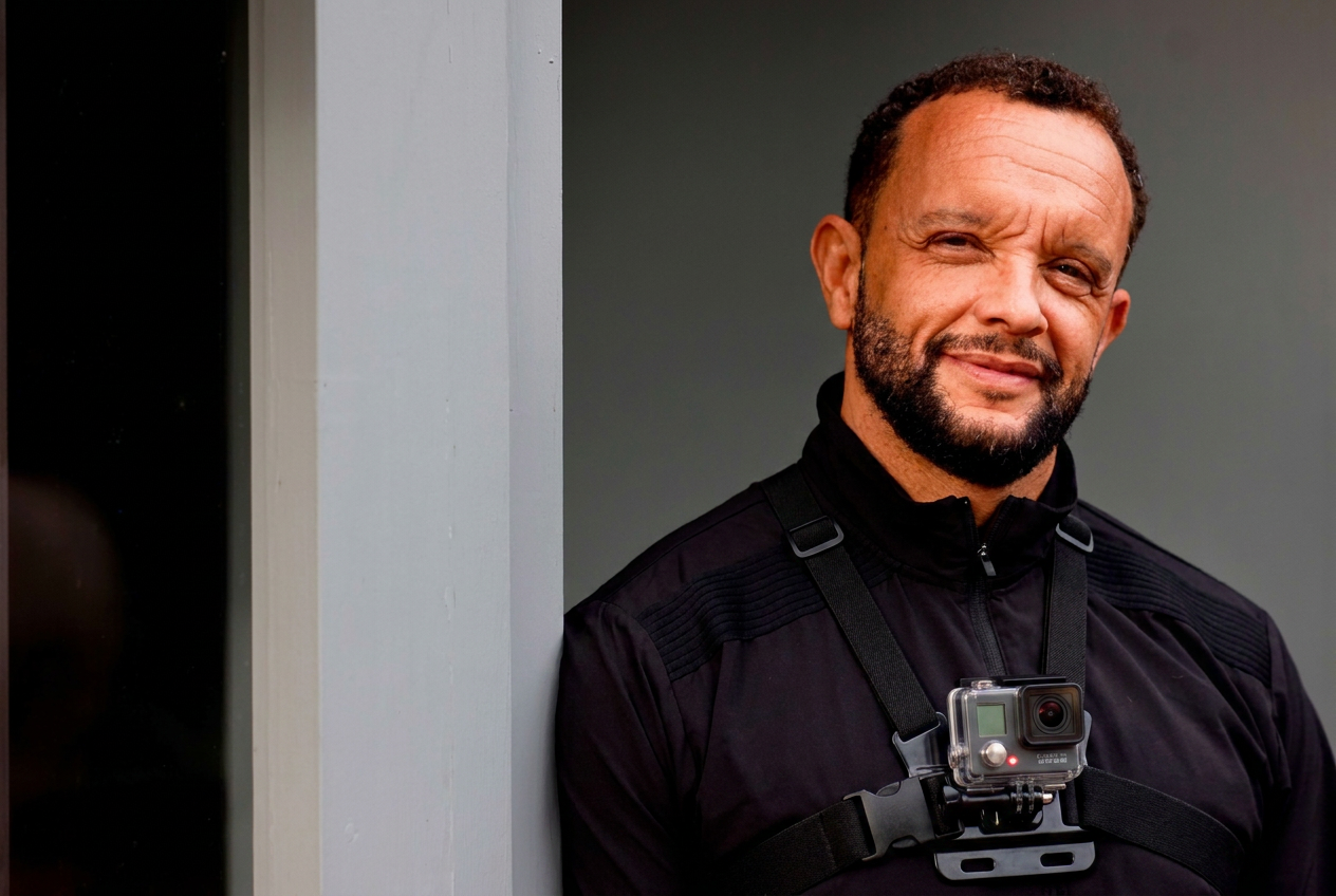 Jamie Baulch with a chest-mounted camera on a content shoot